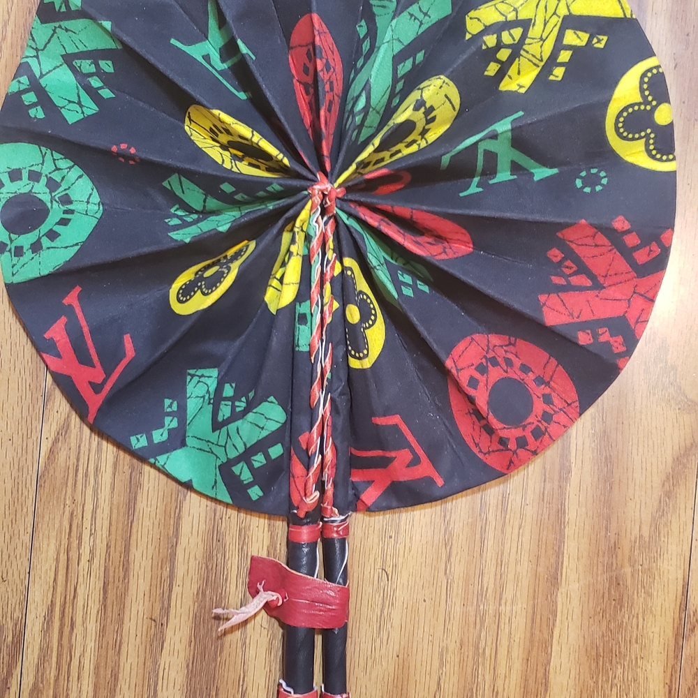 African Ankara Print Folding Fan . Made With Leather Handles .
